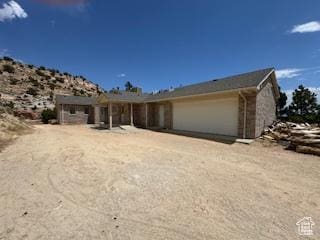 9 Red Cir, Manila, UT 84046 - view of front of house featuring an attached garage