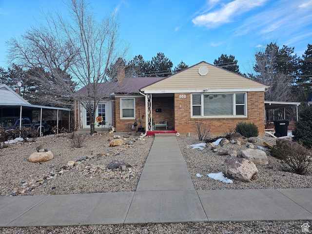 240 N 1400 W, Cedar City, UT 84721 - view of front of house with brick siding and covered porch