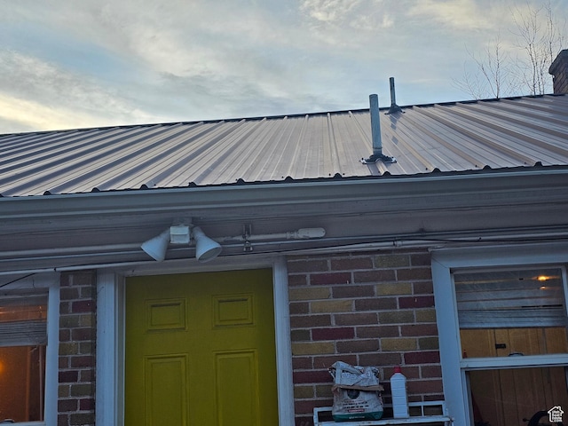 240 N 1400 W, Cedar City, UT 84721 - exterior view of a metal roof and brick siding