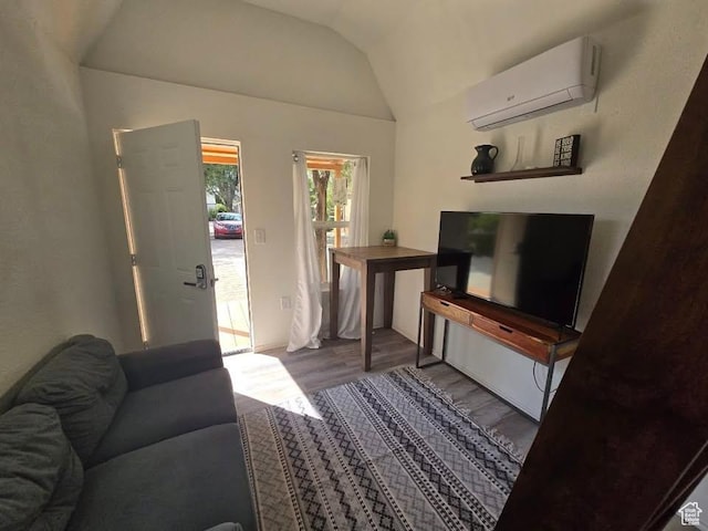 240 N 1400 W, Cedar City, UT 84721 - living room featuring a wall mounted AC, wood finished floors, and lofted ceiling
