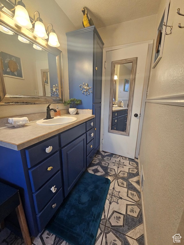 240 N 1400 W, Cedar City, UT 84721 - bathroom with vanity and a textured wall