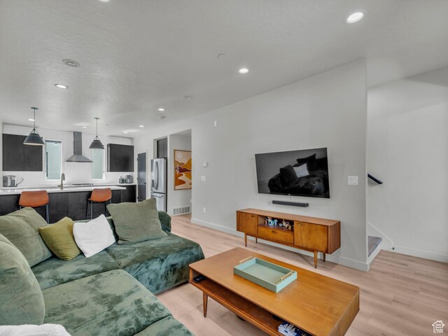 351 W 800 N # 9, Salt Lake City, UT 84103 - living area with recessed lighting, light wood-type flooring, and stairs