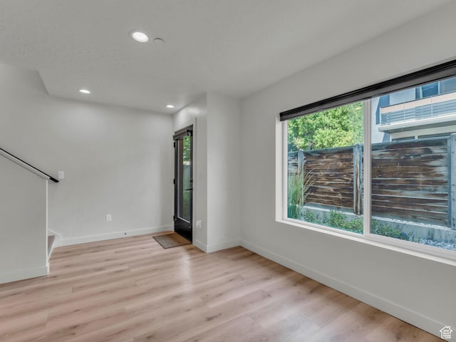 351 W 800 N # 9, Salt Lake City, UT 84103 - spare room with plenty of natural light, recessed lighting, light wood finished floors, and stairway