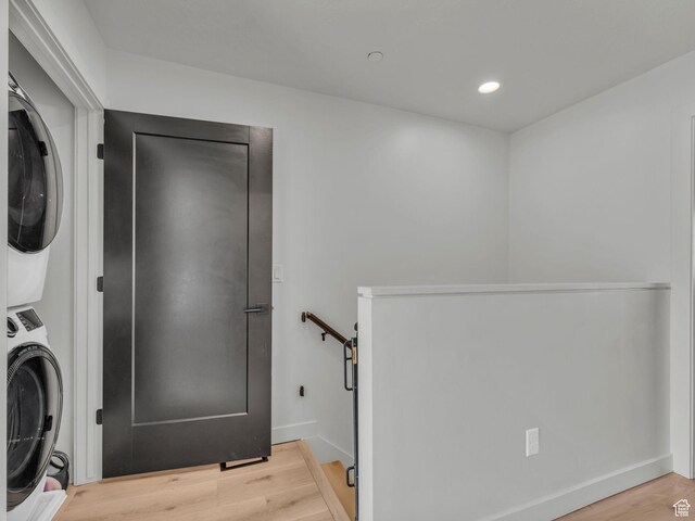 351 W 800 N # 9, Salt Lake City, UT 84103 - laundry room featuring stacked washing machine and dryer, light wood-style floors, and recessed lighting
