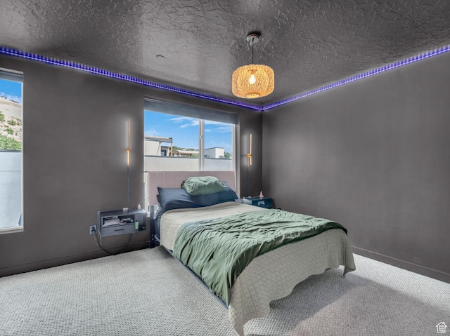 351 W 800 N # 9, Salt Lake City, UT 84103 - bedroom with carpet flooring, multiple windows, and a textured ceiling