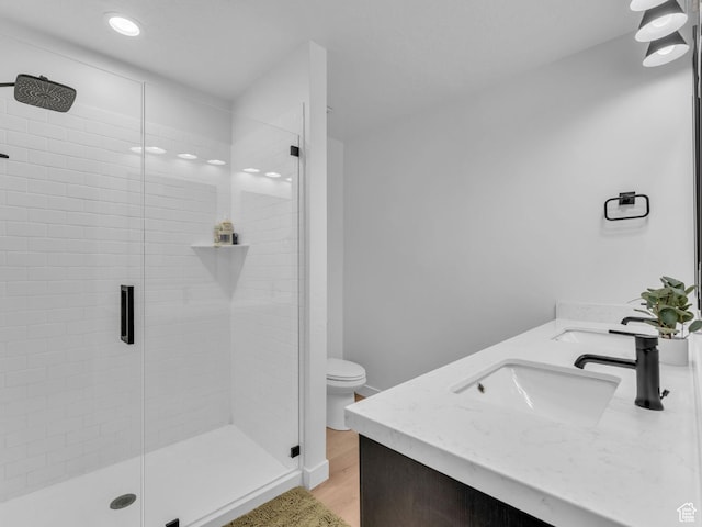 351 W 800 N # 9, Salt Lake City, UT 84103 - full bathroom with double vanity, a stall shower, wood finished floors, and recessed lighting