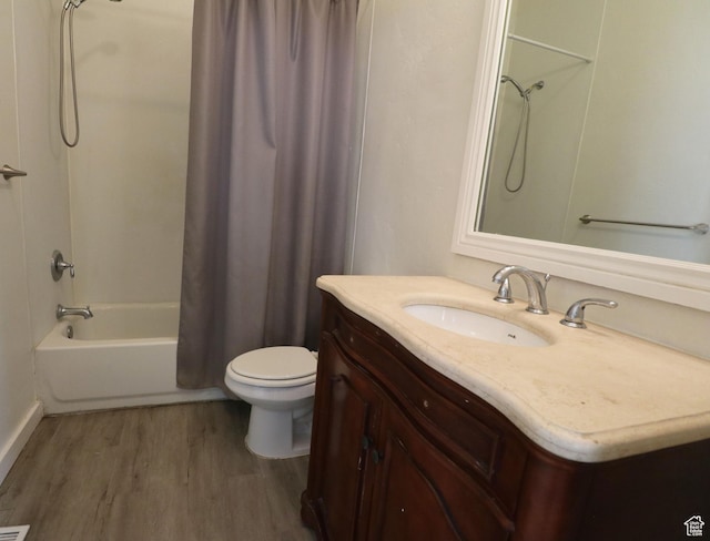 262 E 33rd St S, Ogden, UT 84401 - bathroom featuring wood finished floors, shower / bath combo with shower curtain, and vanity