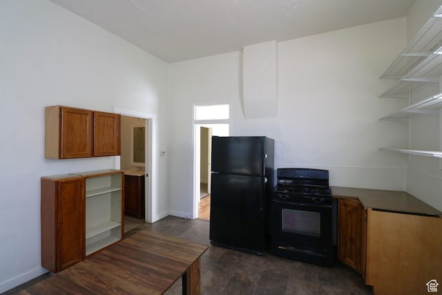 262 E 33rd St S, Ogden, UT 84401 - kitchen with black appliances, open shelves, and brown cabinetry