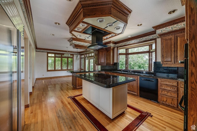 1387 E 260 N, Logan, UT 84321 - kitchen with black appliances, crown molding, light wood-type flooring, decorative backsplash, and island exhaust hood