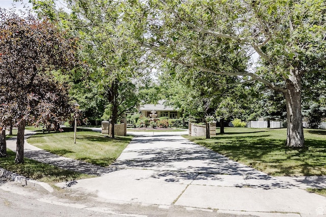 1387 E 260 N, Logan, UT 84321 - view of home's community with a lawn and concrete driveway