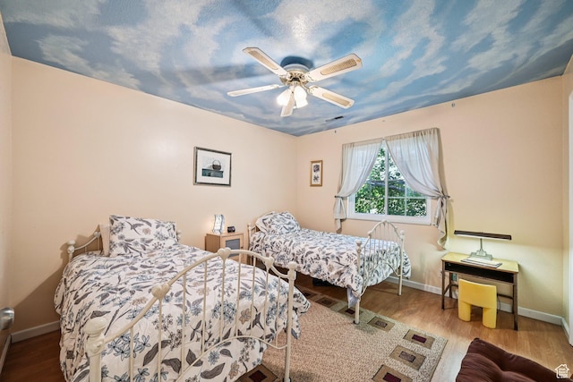 537 E Edindrew Cir, Murray, UT 84107 - bedroom featuring wood finished floors and a ceiling fan
