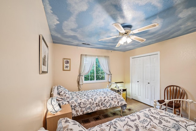 537 E Edindrew Cir, Murray, UT 84107 - bedroom with wood finished floors, ceiling fan, and a closet