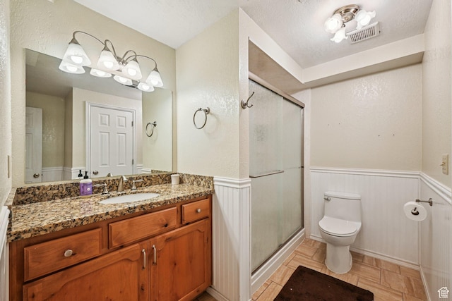 537 E Edindrew Cir, Murray, UT 84107 - bathroom featuring a wainscoted wall, vanity, and a shower stall
