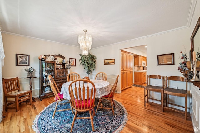 537 E Edindrew Cir, Murray, UT 84107 - dining room with a chandelier, light wood-style flooring, and ornamental molding