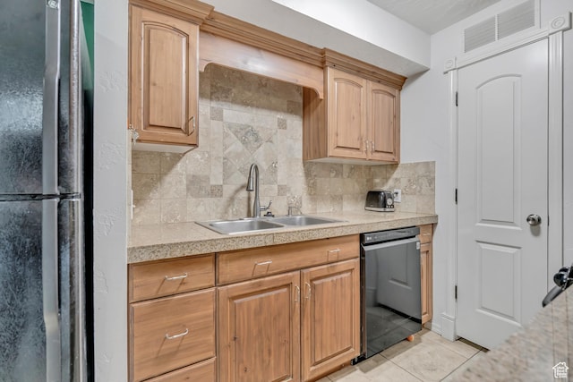 5327 S 560 E Unit F, Murray, UT 84107 - kitchen with dishwasher, freestanding refrigerator, light countertops, decorative backsplash, and light tile patterned floors