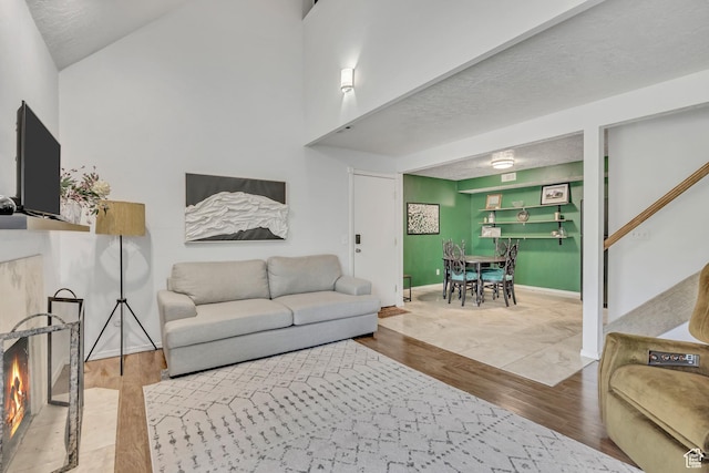 5327 S 560 E Unit F, Murray, UT 84107 - living room with wood finished floors and stairway