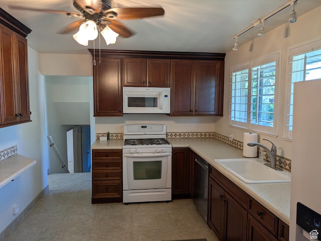 7481 S Castle Hill Cir, Cottonwood Heights, UT 84121 - kitchen with white appliances, rail lighting, light countertops, and ceiling fan