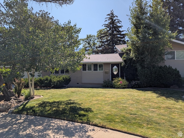 7481 S Castle Hill Cir, Cottonwood Heights, UT 84121 - view of front of property featuring a front lawn and brick siding