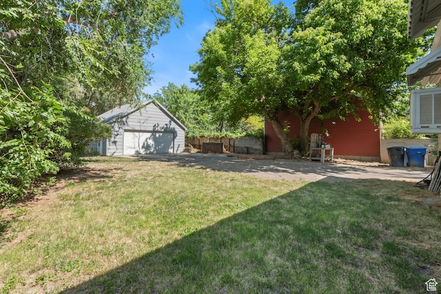 3245 S 1000 E, Millcreek, UT 84106 - view of grassy yard featuring a detached garage and an outdoor structure