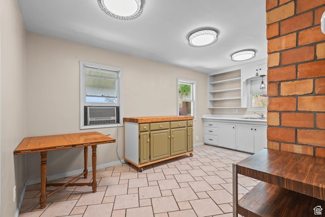 3245 S 1000 E, Millcreek, UT 84106 - kitchen featuring green cabinetry, open shelves, and cooling unit