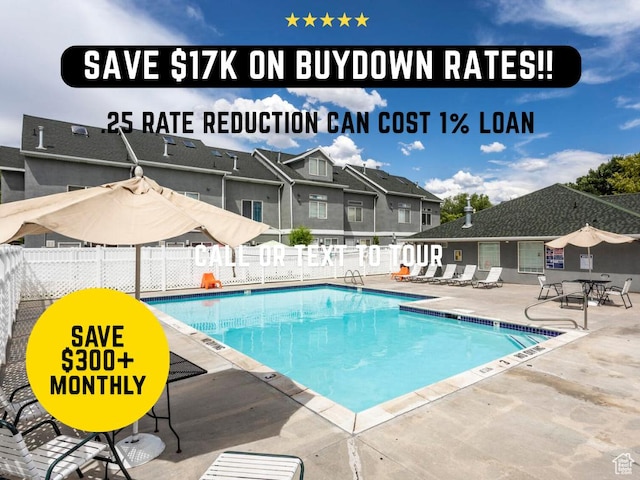 475 N Redwood Rd Unit 80, Salt Lake City, UT 84116 - community pool featuring a patio and a residential view