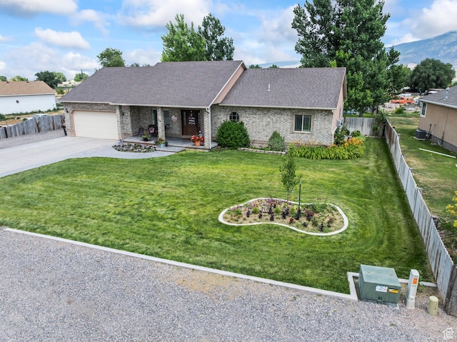 80 N 200 W, Central Valley, UT 84754 - view of front of property featuring driveway, brick siding, an attached garage, and a shingled roof