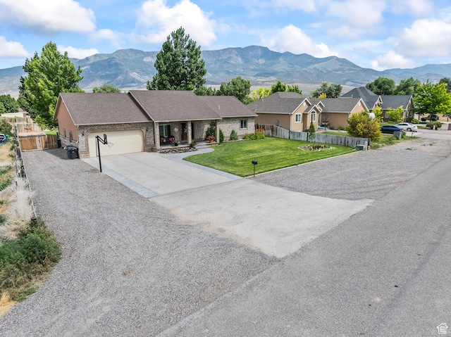 80 N 200 W, Central Valley, UT 84754 - ranch-style home with driveway, a garage, and a mountain view