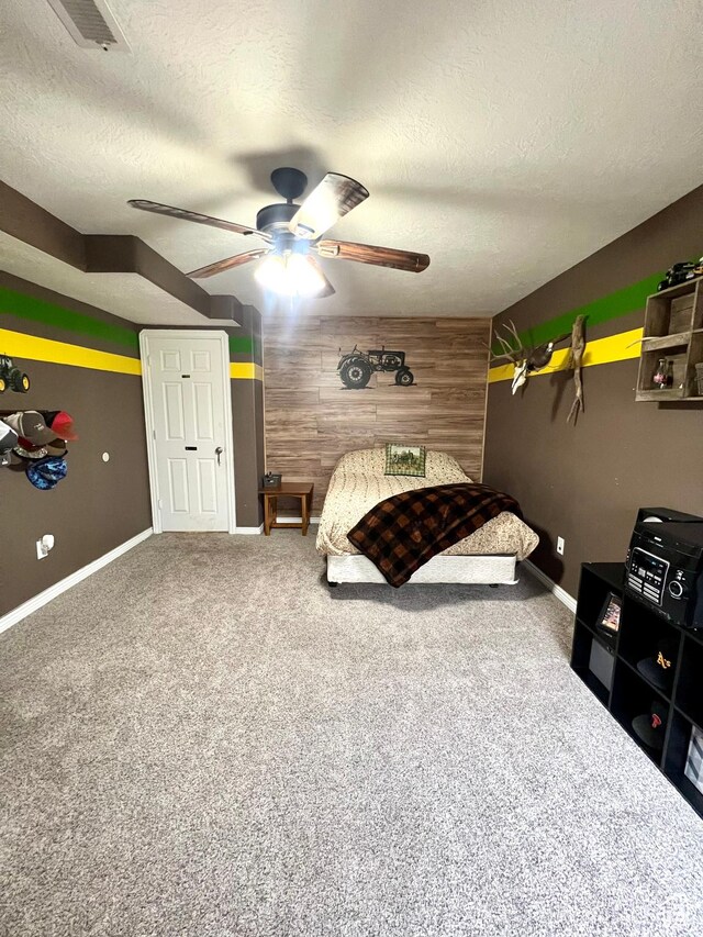 80 N 200 W, Central Valley, UT 84754 - carpeted bedroom with a textured ceiling, wood walls, and ceiling fan