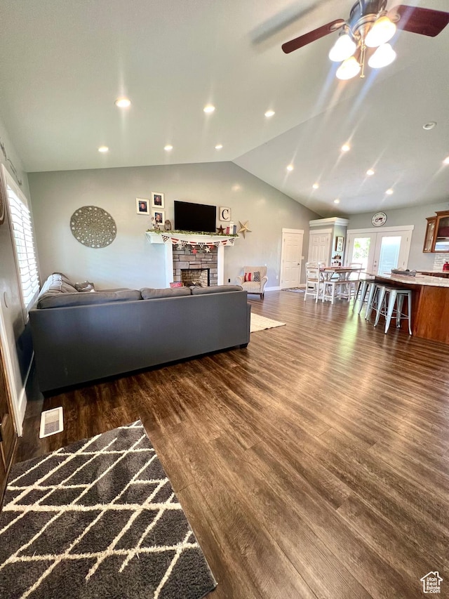 80 N 200 W, Central Valley, UT 84754 - living room featuring a fireplace, ceiling fan, vaulted ceiling, wood finished floors, and recessed lighting