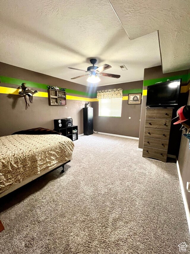 80 N 200 W, Central Valley, UT 84754 - bedroom featuring a textured ceiling, carpet flooring, and a ceiling fan