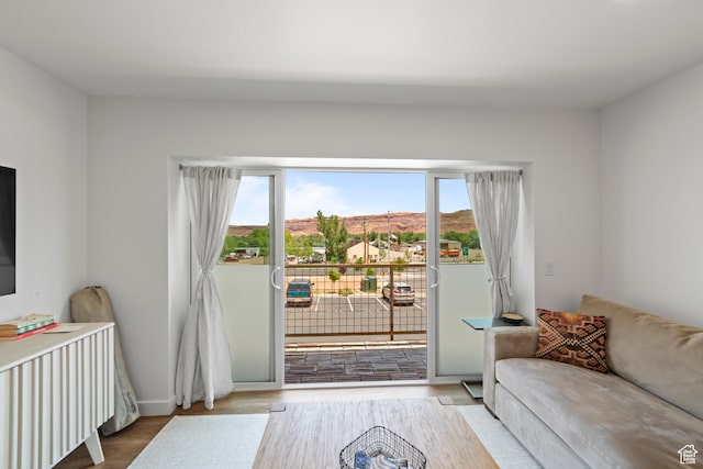 443 Kane Creek Blvd Unit 212, Moab, UT 84532 - living room with healthy amount of natural light and wood finished floors