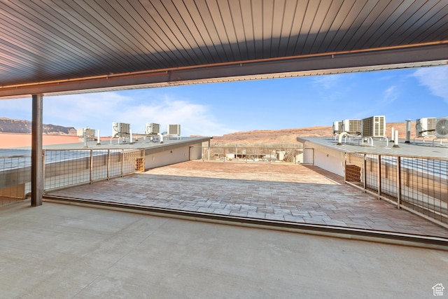 443 Kane Creek Blvd Unit 212, Moab, UT 84532 - view of patio with a city view and a mountain view