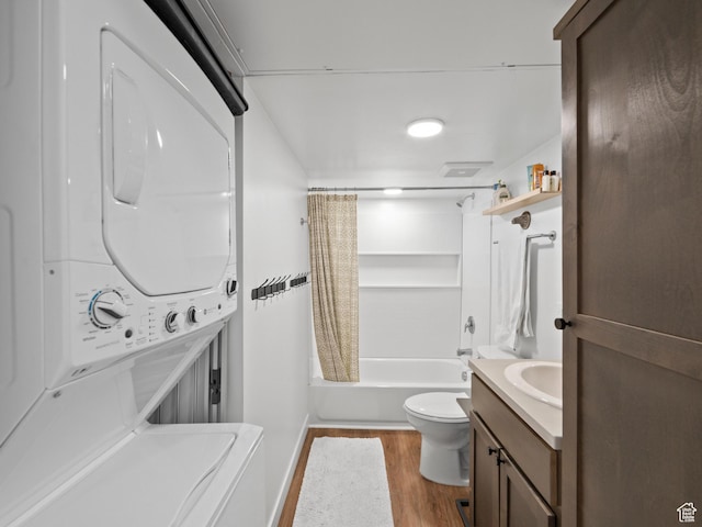 443 Kane Creek Blvd Unit 212, Moab, UT 84532 - full bathroom with stacked washer and clothes dryer, wood finished floors, vanity, and shower / tub combo