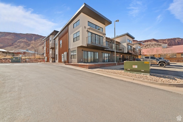 443 Kane Creek Blvd Unit 212, Moab, UT 84532 - view of building exterior with a mountain view