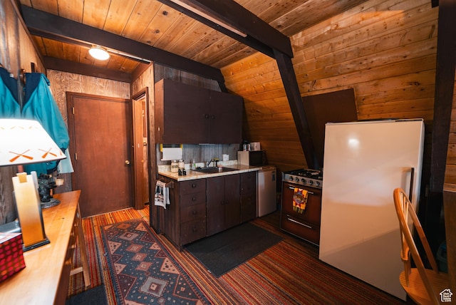 11106 E Greenbriar Rd Unit 462, Heber City, UT 84032 - kitchen featuring gas stove, wooden ceiling, wooden walls, freestanding refrigerator, and light countertops