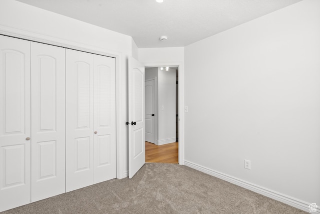 713 S 600 E, Layton, UT 84041 - unfurnished bedroom featuring carpet floors and a closet