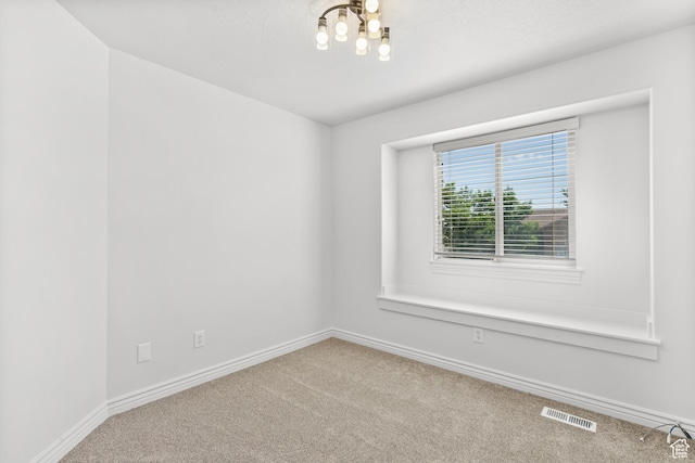 713 S 600 E, Layton, UT 84041 - carpeted empty room featuring a chandelier and baseboards