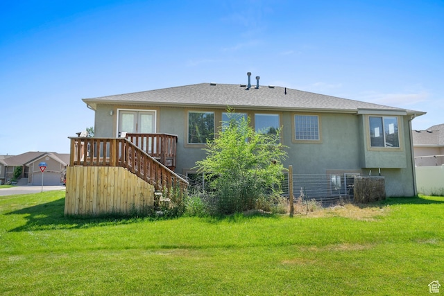 713 S 600 E, Layton, UT 84041 - rear view of property featuring stucco siding, a lawn, stairs, and french doors