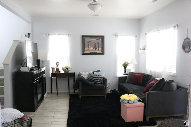 1521 N 420 W Unit 104, Logan, UT 84341 - living area with light wood-style floors