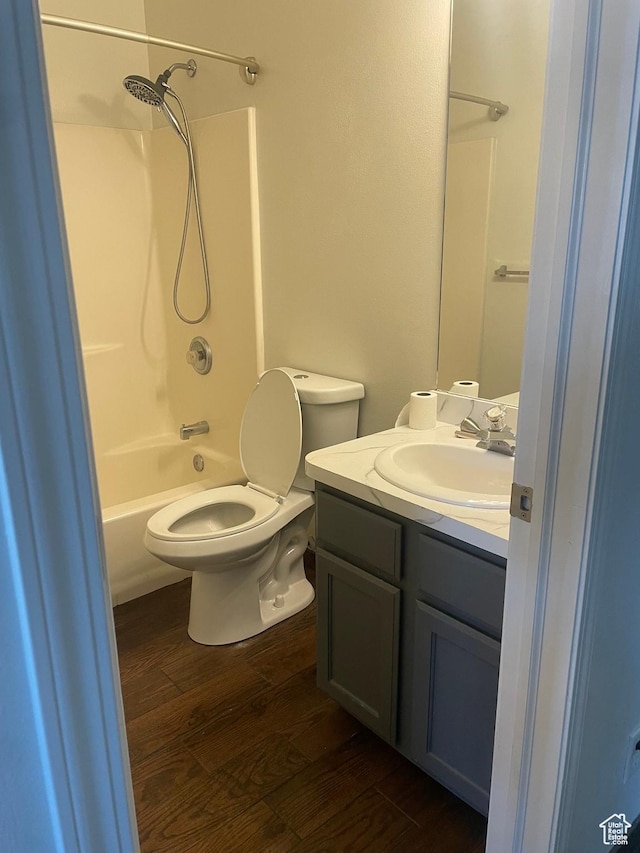 444 E Mitchell Cv Unit 103, South Salt Lake, UT 84115 - full bath featuring wood finished floors, vanity, and  shower combination