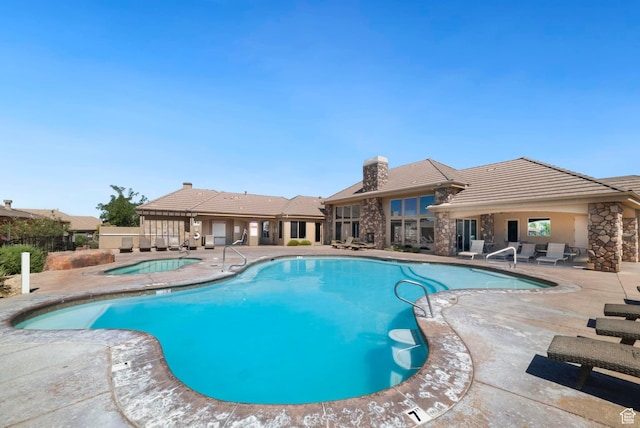 2076 N Doral Ct, Washington, UT 84780 - community pool featuring a patio area and a community hot tub