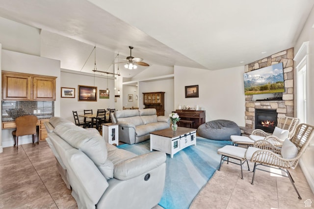 562 E 260 S, Midway, UT 84049 - living room featuring ceiling fan, a fireplace, light tile patterned floors, and lofted ceiling
