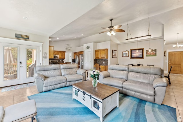 562 E 260 S, Midway, UT 84049 - living area featuring light tile patterned flooring, lofted ceiling, ceiling fan, recessed lighting, and french doors