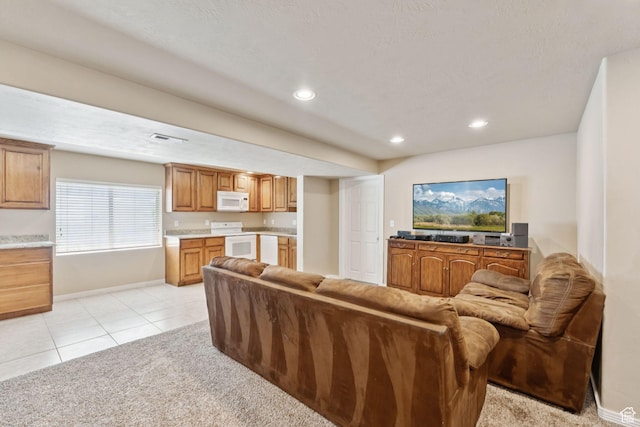 562 E 260 S, Midway, UT 84049 - living room featuring light tile patterned flooring, recessed lighting, and light colored carpet