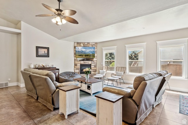 562 E 260 S, Midway, UT 84049 - living area with a fireplace, ceiling fan, lofted ceiling, and light tile patterned flooring