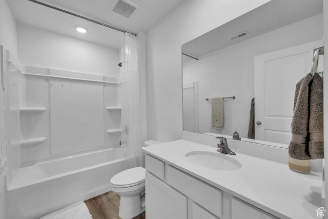 3217 E Elkhorn Ln, Washington, UT 84780 - bathroom featuring vanity, wood finished floors, and shower / bathtub combination