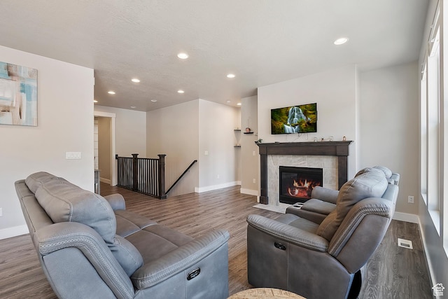 3359 N Redshoulder Dr, Layton, UT 84040 - living area featuring recessed lighting, wood finished floors, and a tile fireplace