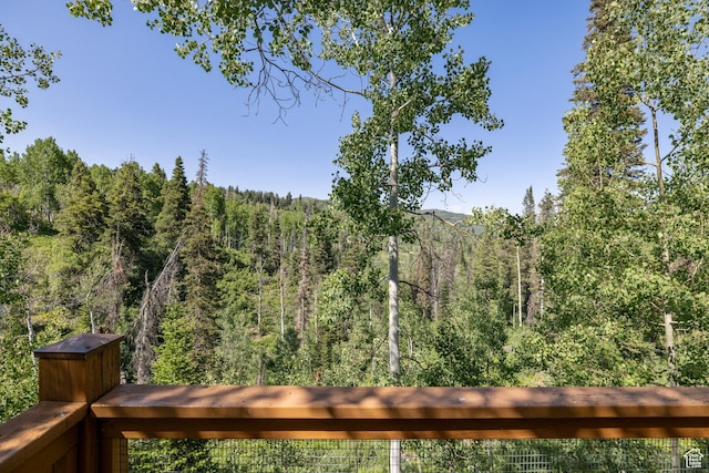1519 Pine Needle Cir, Coalville, UT 84017 - wooden deck featuring a forest view