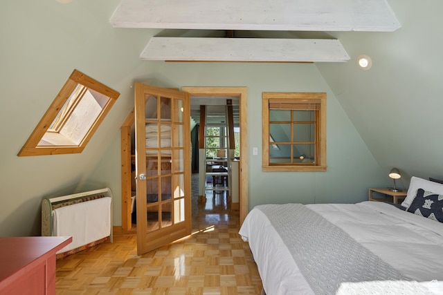 1519 Pine Needle Cir, Coalville, UT 84017 - bedroom with lofted ceiling, a skylight, and radiator
