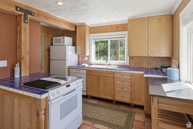 1519 Pine Needle Cir, Coalville, UT 84017 - kitchen featuring tile counters, white appliances, light brown cabinetry, recessed lighting, and wooden walls